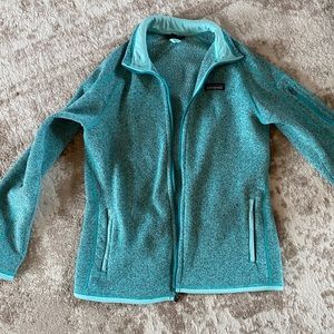Women’s turquoise Patagonia jacket